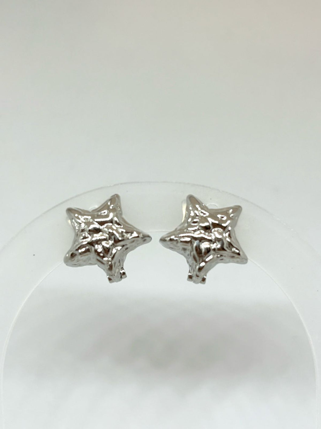 ARETES PLATEADOS ESTRELLA DOBLE LADO