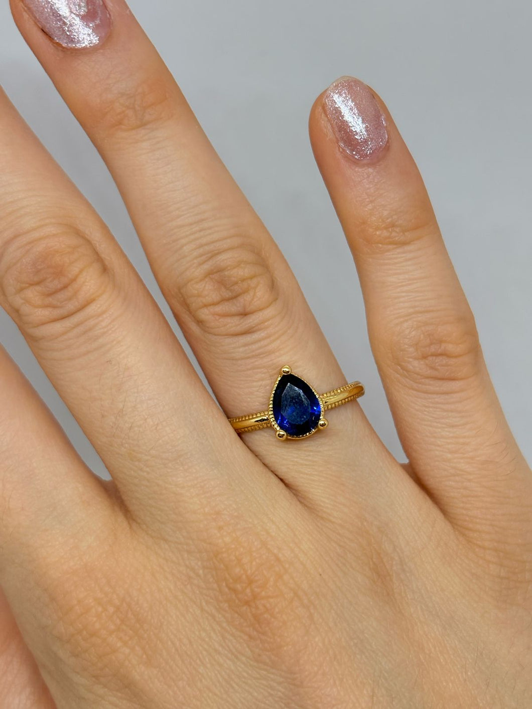 ANILLO GOTA ZIRCONIA AZUL