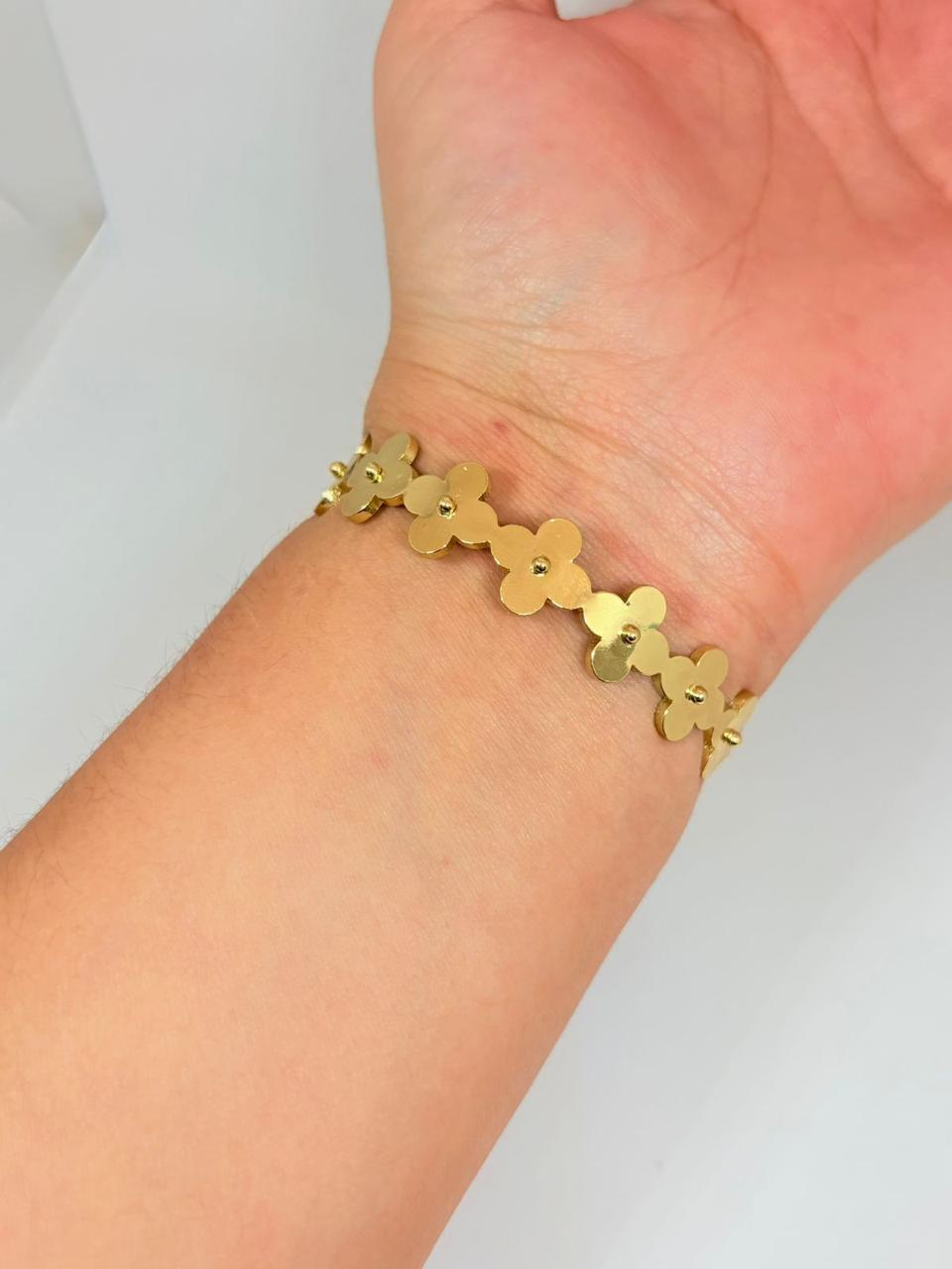 PULSERA FLORES LISAS DORADA