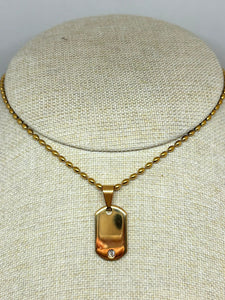 COLLAR BOLITAS CON PLACA ZIRCONIA