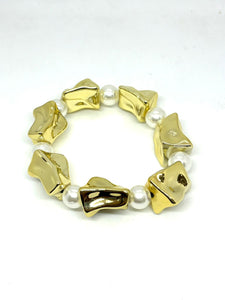 PULSERA CON PERLAS DOS TONOS