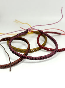 PULSERA TRENZADA HILO