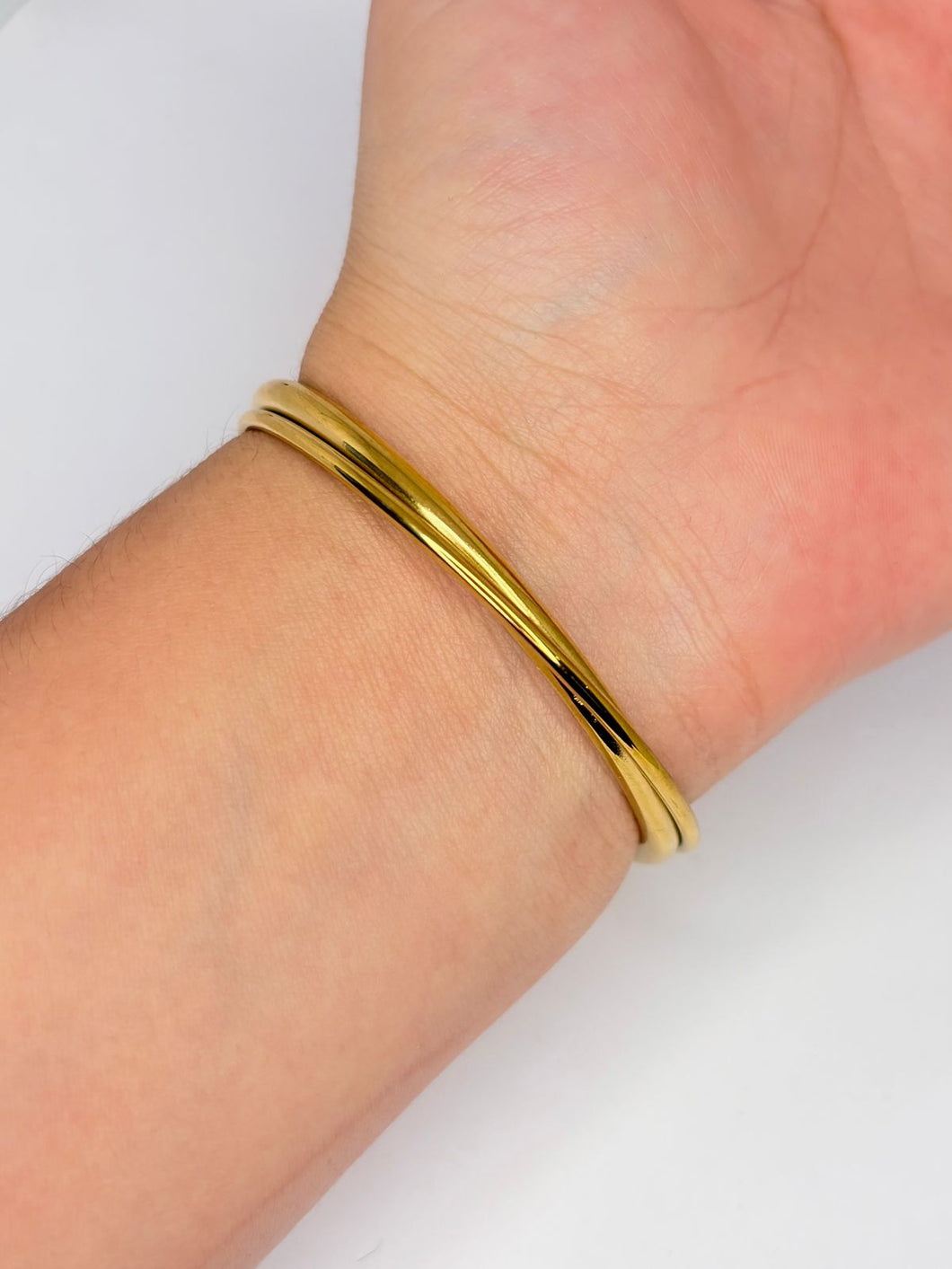 BRAZALETE RIGIDO CRUZADO