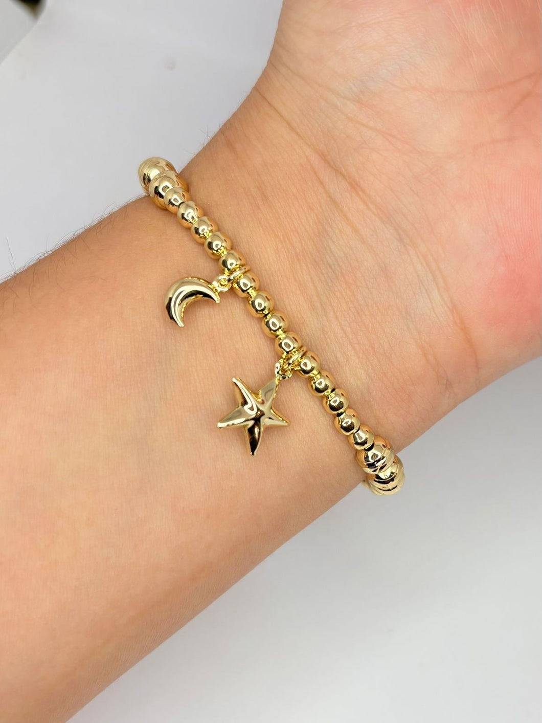 PULSERA BOLITAS ESTRELLA Y LUNA