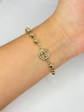 Cargar imagen en el visor de la galería, PULSERA BOLITAS SAN BENITO Y CRUCIFIJO
