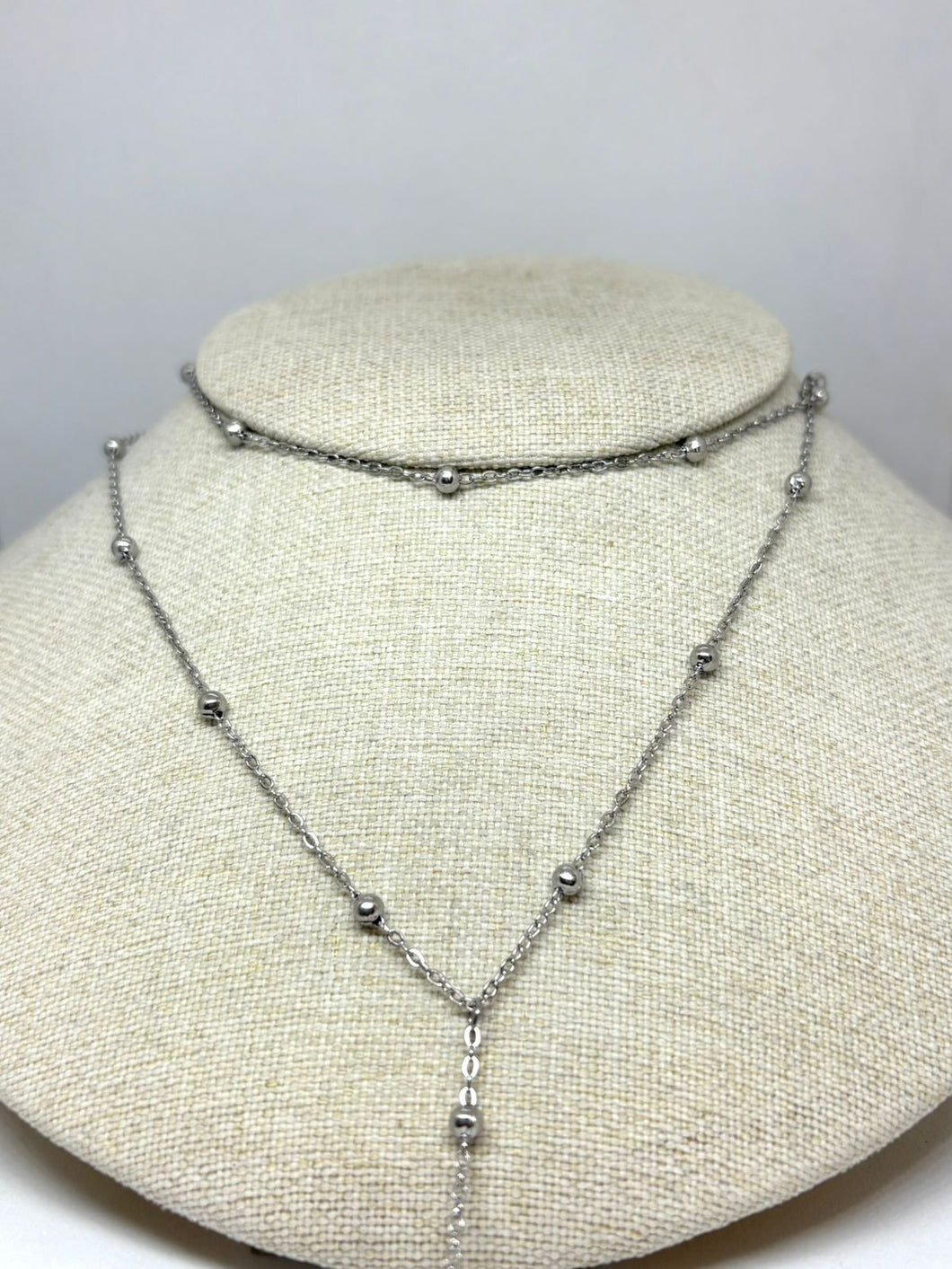 COLLAR CORBATERO DOBLE BOLITAS