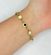 Cargar imagen en el visor de la galería, PULSERA CIRCULOS NACAR/ONIX NUMEROS ROMANOS

